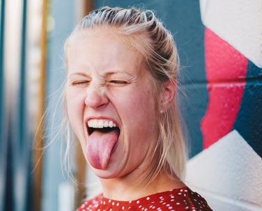 Woman sticking her tongue out