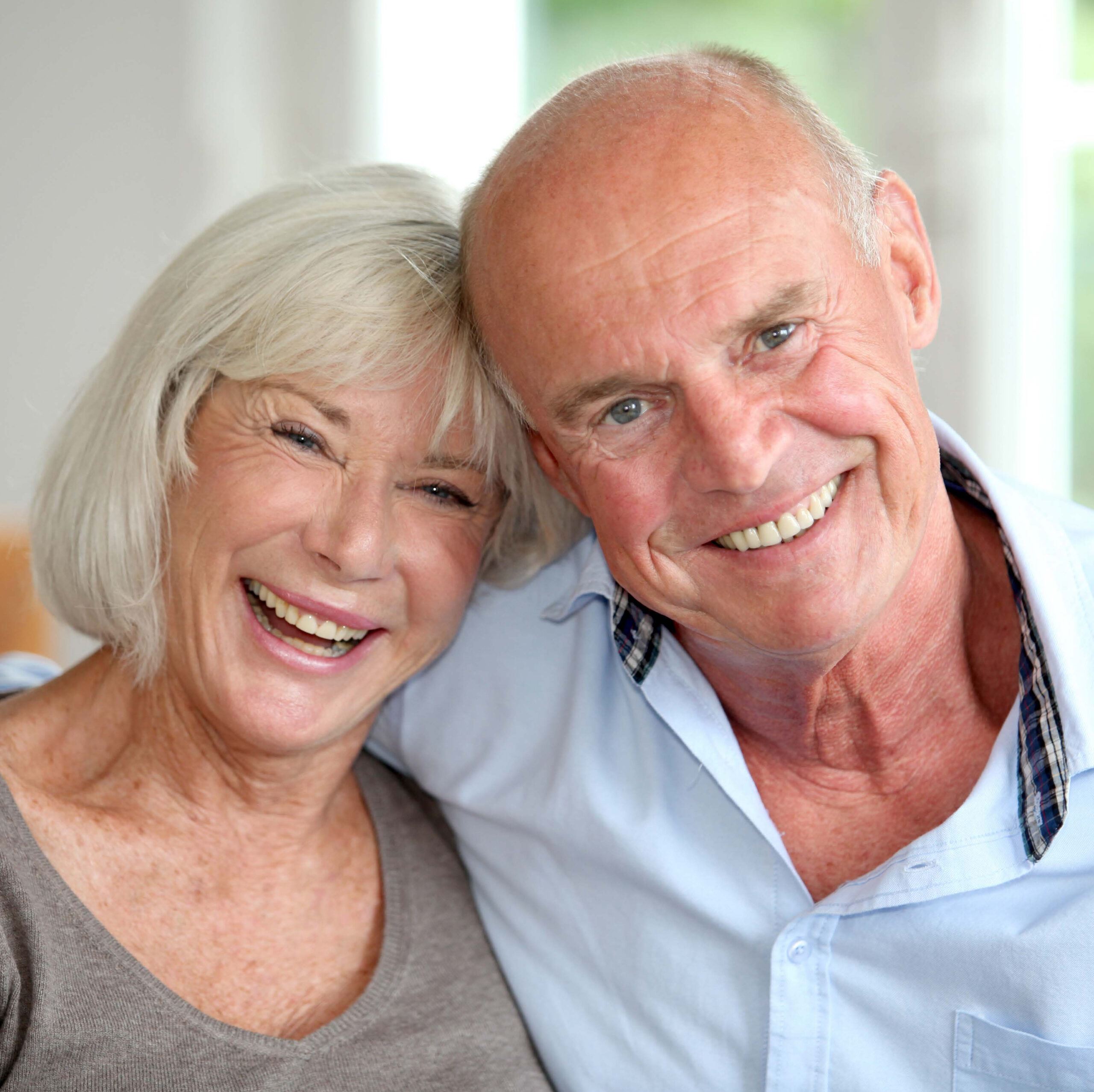 Elderly couple smiling